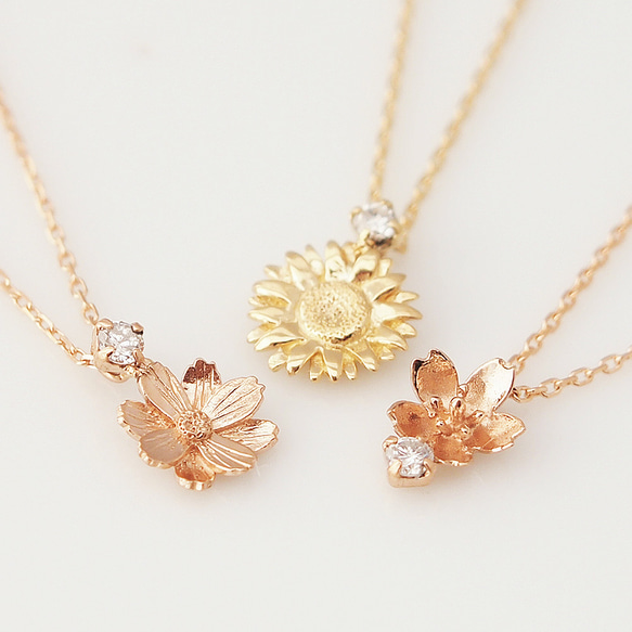 K18ダイヤモンドとお花のネックレス　0.03ct　向日葵　コスモス　桜 1枚目の画像