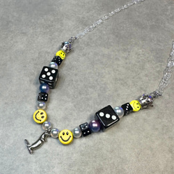 ニコちゃん×ブラックサイコロネックレス ネックレス・ペンダント RET