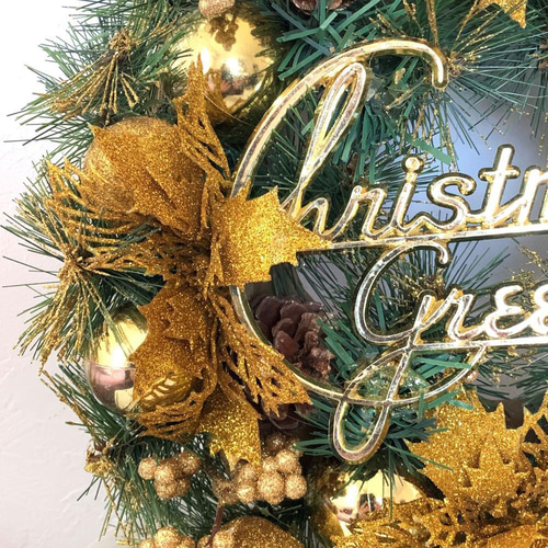 海外輸入 クリスマスリース ゴールド メリークリスマス 松ぼっくり