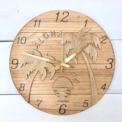 ヤシの木のウッドロゴ壁掛け時計 ハワイアンデザイン時計 ウォールクロック 丸型 夕陽のシルエット ホノルルの海 パーム 1枚目の画像