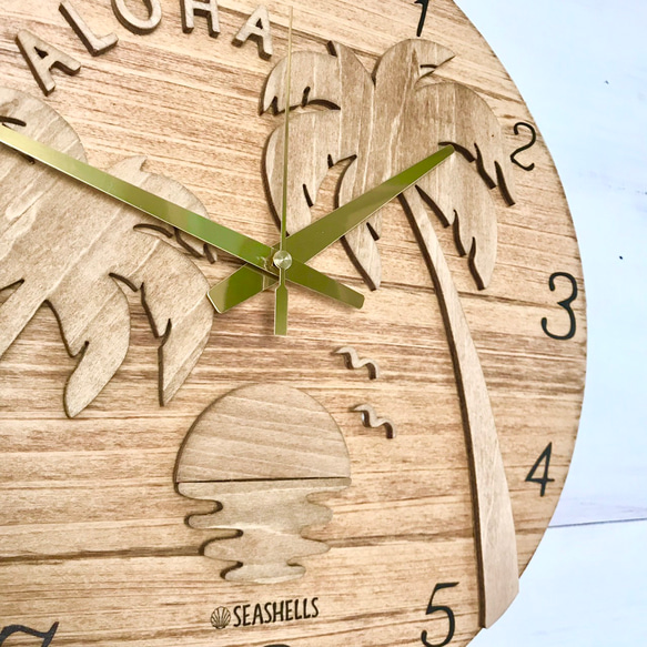 ヤシの木のウッドロゴ壁掛け時計 ハワイアンデザイン時計 ウォールクロック 丸型 夕陽のシルエット ホノルルの海 パーム 5枚目の画像