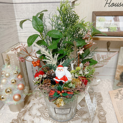 【送料無料】〜よっこらしょ♪森に到着♡サンタさん〜造花アレンジメント　フェイクグリーン　クリスマスインテリア　置物 1枚目の画像