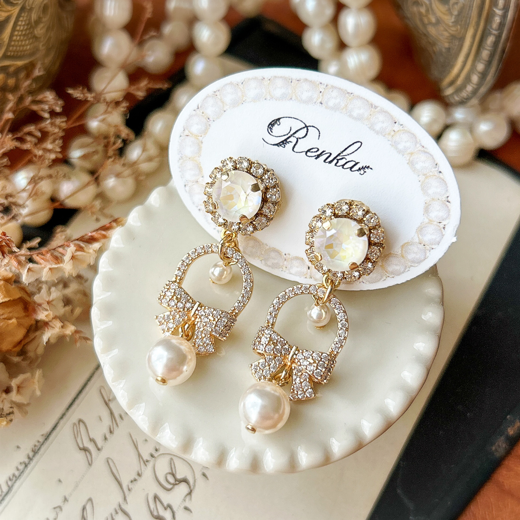 リボンとパールのピアス【スワロフスキー･上品･ウェディング･ブライダル･wedding】{RPG-1020｝