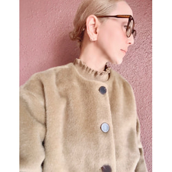 RATA❤️特製優質面料❤️成人超保暖冬季外套❤️百搭時尚，可輕鬆搭配現代或復古服飾❤️米色絨毛 第2張的照片