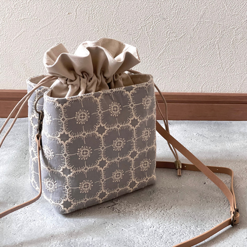 ミナ ペルホネン ハンドメイド ショルダーバッグ ラウンドポーチ