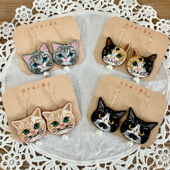 ☆ オンライン限定✩.*˚両耳猫さん刺繍とコットンパールのピアス 1枚目の画像