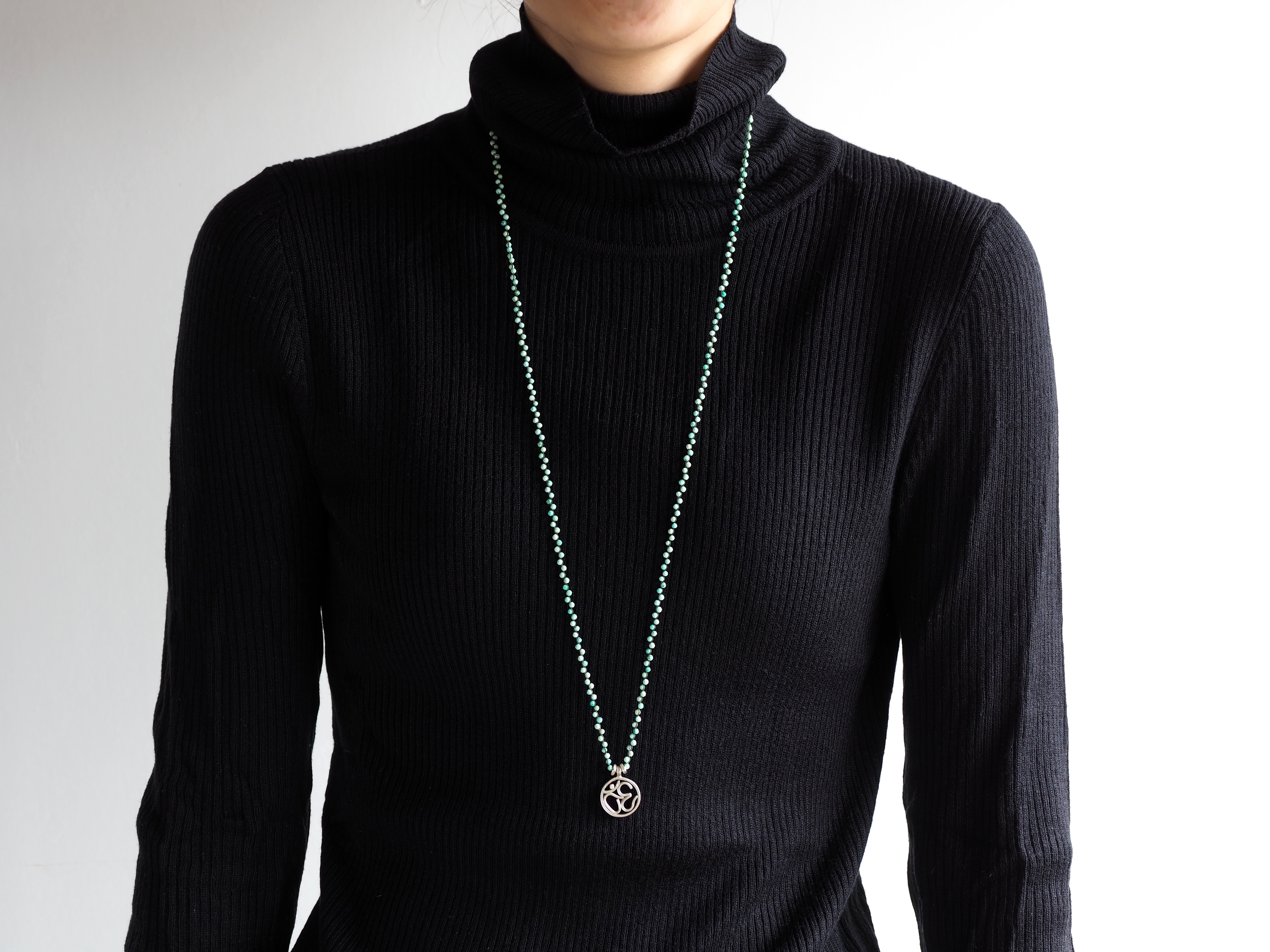 AUM-charm long pendant 'Crysocolla'