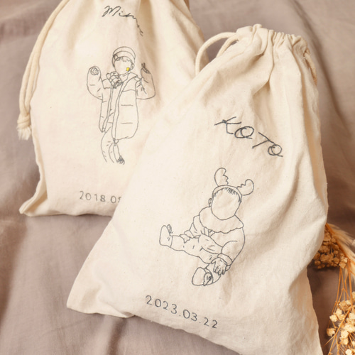 特集掲載】【名入れ】手刺繍で紡ぐ線画似顔絵コットン巾着 巾着袋