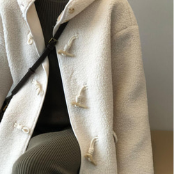 牛の角ボタンが羊の毛を象ったコート女性の冬の新作ミドル丈のゆったりした毛のコート 2枚目の画像