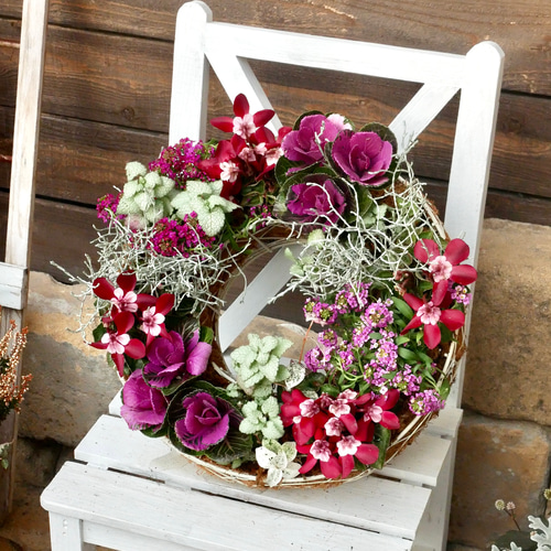 人工花の円形リース d41b5f1dbbe5794c9d543bb5c0c4a4