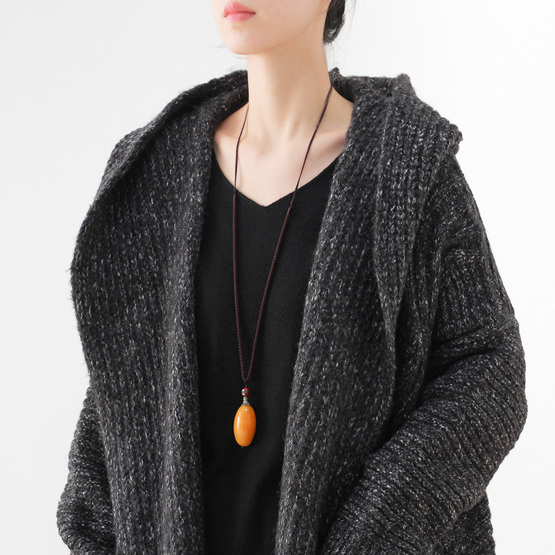 背中のツイストライン入りが珍しい♪アクリルロングカーディガン