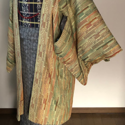 単衣長羽織　ウール　リーフグリーンに和柄きりばめ柄なぜかクリムト風の華やぎ 1枚目の画像