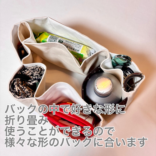 肩掛けが楽なショルダーバッグ 大きな外ポケットが便利 ラウンド