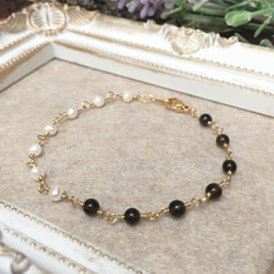 14kgf 】【魅惑の輝き】10㎜ブラックラブラドライトのネックレス45