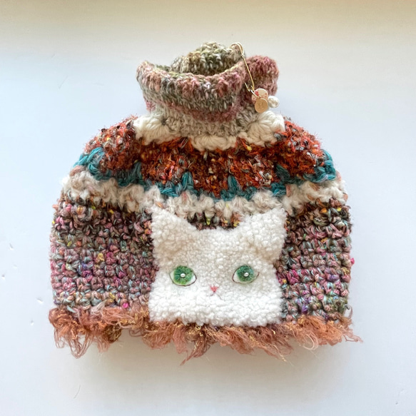 奇特的針織貓帽磚色 第1張的照片