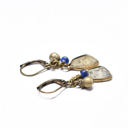 Prakluang 和藍色古董珠、民族鐘形耳環 第6張的照片