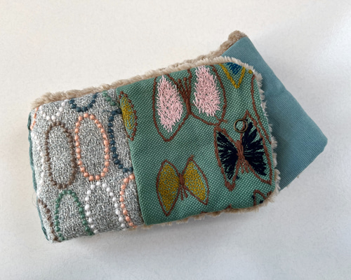 ミナペルホネン コドモのネックウォーマー スカイフラワー タルト