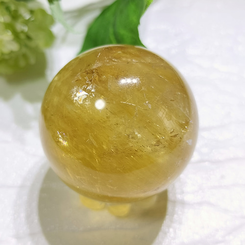 天然石　虹入り　ゴールデンカルサイトスフィア 楽天市場】カルサイト 丸玉 虹入り 76mm 台座付属 ホワイトカル