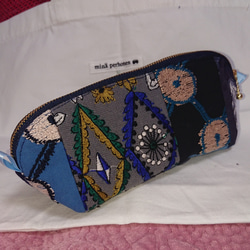 りんご　ハンドメイド まあるいポーチ ミナペルホネン生地使用♪ りんご ハンドメイド まあるいポーチ ミナペルホネン生地使用