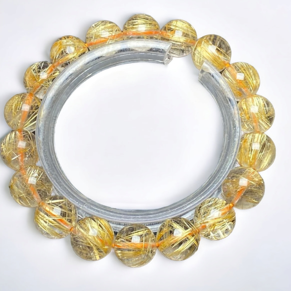 ゴールドタイチンルチルクォーツ[KyJc]11.5mm 超品位 キャッツアイ