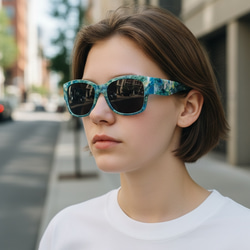 ターコイズボタニカルのサングラス 1枚目の画像