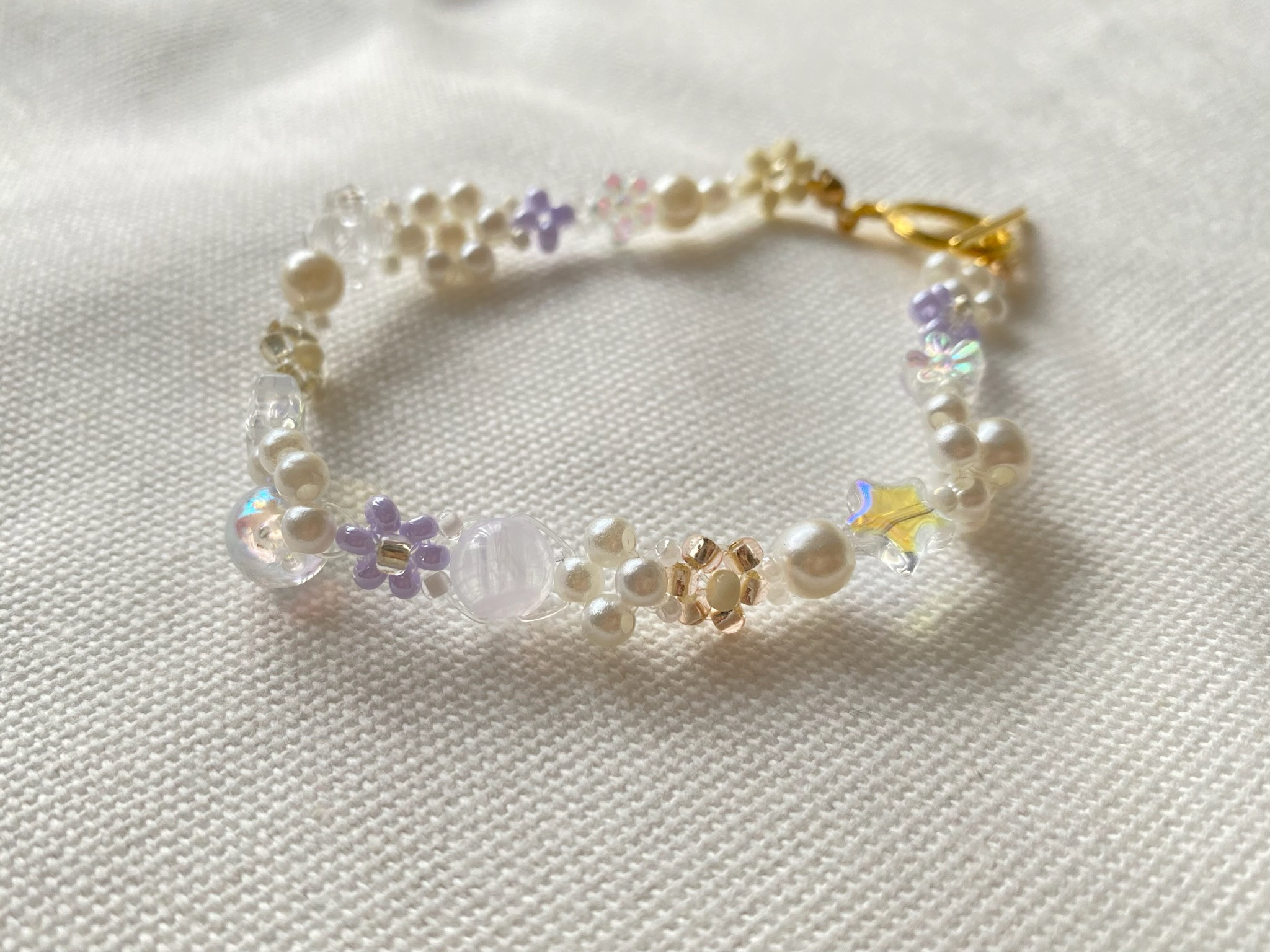 ハンドメイド ホワイトクリスタルビーズブレスレット ホワイトクリスタル ビーズブレスレット - メルカリ