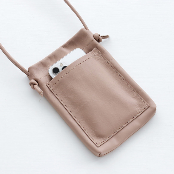 真皮智慧型手機肩挎粉筆皮革小袋，也可用作助手袋，內部布料（粉紅色米色）。 第10張的照片