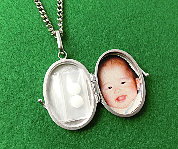 【手彫り】遺骨入れ＆写真入れ兼用・ロケットペンダント/銀製/楕円型◎遺骨と写真を同時に両側に入れることができます。日本製 20,440円