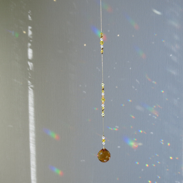 トパーズ　黄金の煌めき　スワロフスキーサンキャッチャークリスタル　ゴールド×イエロー  サンキャッチャー　20mm 13枚目の画像