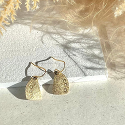 〝陽光〟真鍮アクセサリー 1枚目の画像