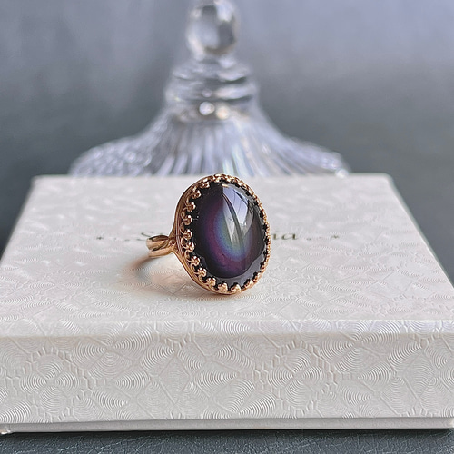 研磨品　十勝石玲瓏　イエローベースレインボーオブシディアン 十勝石玲瓏石（レインボーオブシディアン） 原石180g 天然石