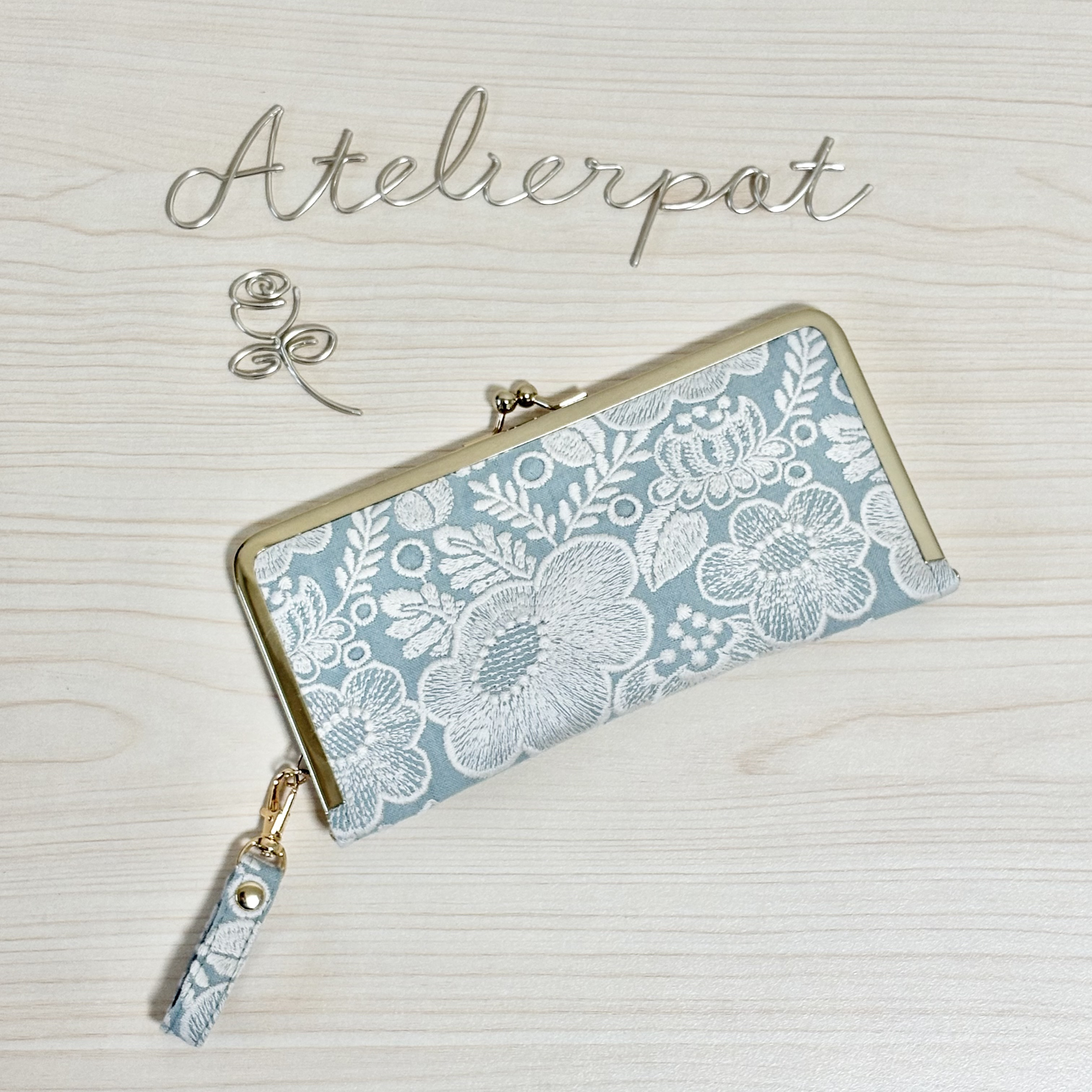 ★ミナペルホネン★smileflower light greenのがま口財布★持手付