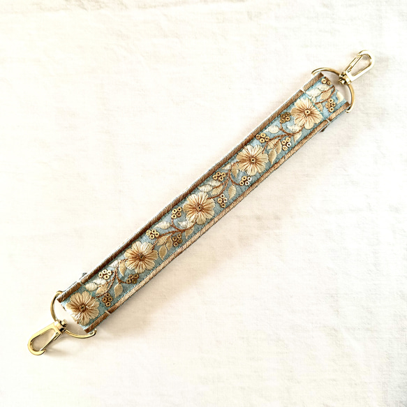 印度刺繡絲帶手帶智慧型手機搭配短帶天藍色金色 第3張的照片
