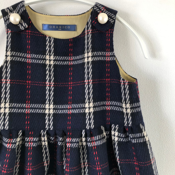 【100】紺に赤白チェック/大きなパールボタンのよそゆきワンピース【ネイビー/子ども服】 1枚目の画像