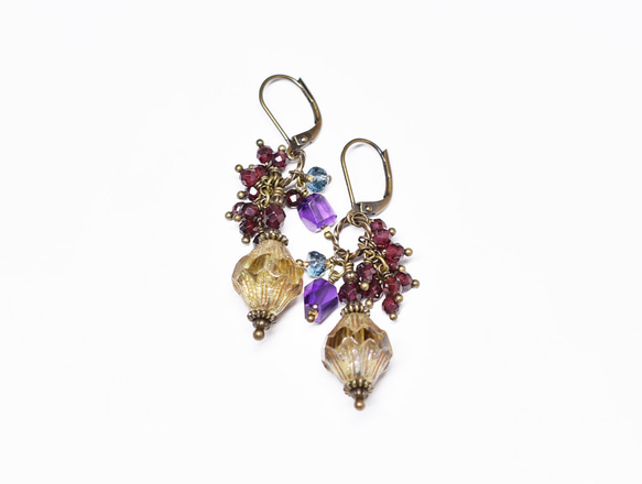 耳環，鑲嵌捷克珠、重石榴石、倫敦藍托帕石和紫水晶 第3張的照片