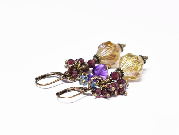 耳環，鑲嵌捷克珠、重石榴石、倫敦藍托帕石和紫水晶 第5張的照片