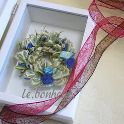 【フォトフレーム　イエロー系】～リボン・巻バラで作る可愛いリース～ 　結婚・出産など、お祝いにも最適です。 2枚目の画像