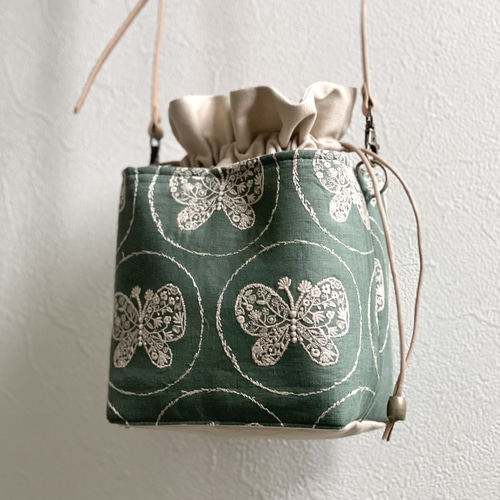 あおりポケットの巾着バッグ＊ミナペルホネン foresttile f0e9d50f902038d1a8f1e1a4945806