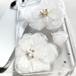 iPhone15pro iPhone14pro 雙白色山茶花智慧型手機保護殼透明保護殼花相容於所有型號 第9張的照片