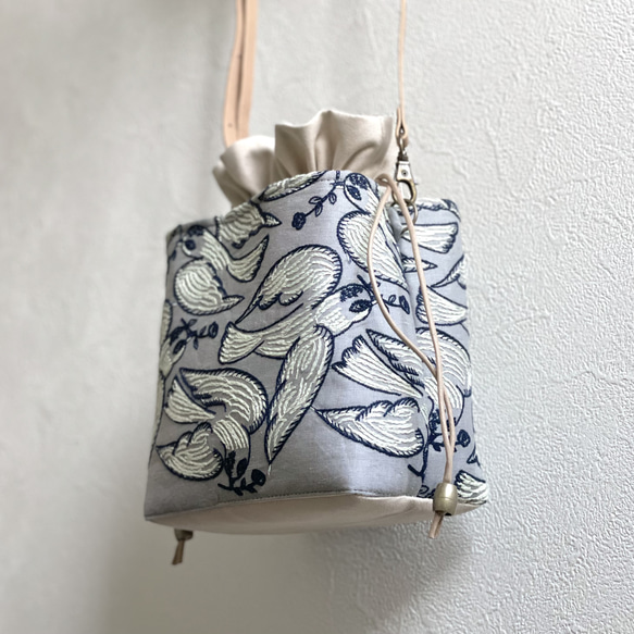 ミナペルホネン ハンドメイド あおりポケット巾着バッグ バッグ ショルダーバッグ ミナペルホネン ハンドメイド あおりポケット巾着トート Lulu