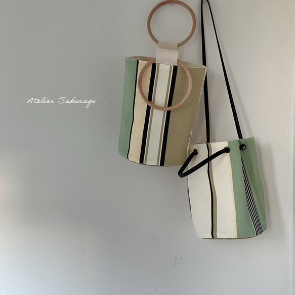 ピスタチオグリーンのフランス生地×ウッド調ハンドルor巾着選べるバケツバッグ 1枚目の画像