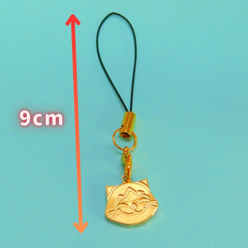 ニッコリ笑顔の猫ちゃん ストラップ 透明レジンでコーティング 真鍮製