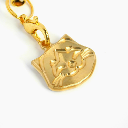 ニッコリ笑顔の猫ちゃん ストラップ 透明レジンでコーティング 真鍮製