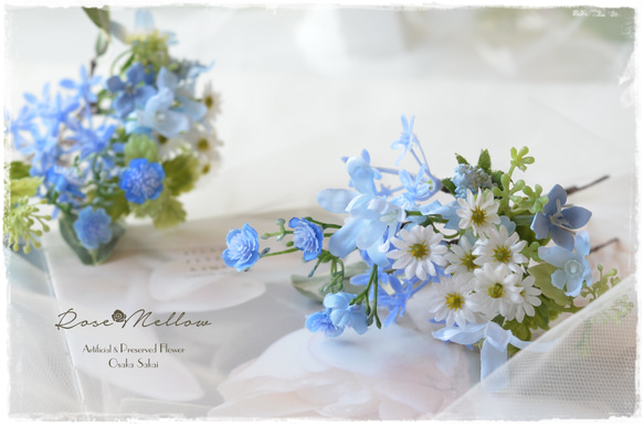 Creema限定【送料無料・ヘッドドレス】ブルーの小花とデージーの組み合わせ自由な19パーツ　ウェディング・卒業式 1枚目の画像