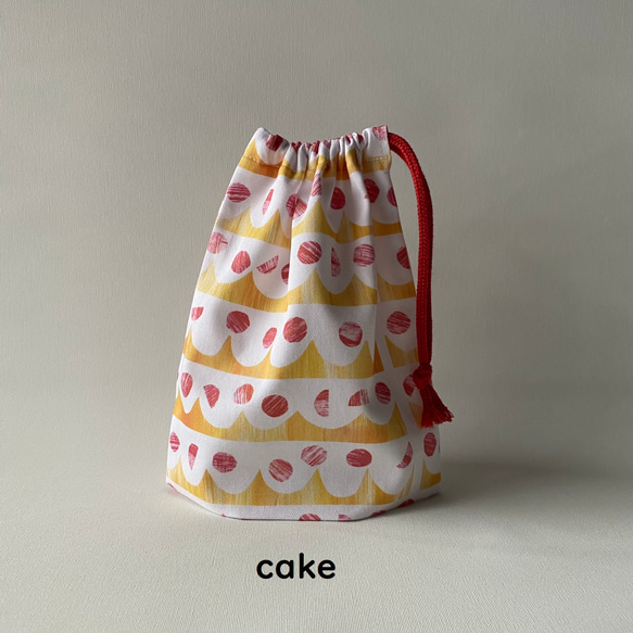 【受注製作】デザイナーズファブリックのコップ袋　サイズ（大）cake柄、yamanami柄 2枚目の画像
