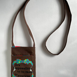 ドットリボン刺繍のブラウンスマホショルダー 1枚目の画像