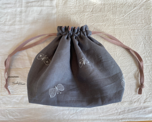 ミナペルホネン　symphony ころりん巾着型　小バック　ランチ入れにも tambourine mini muffin bag - minä perhonen