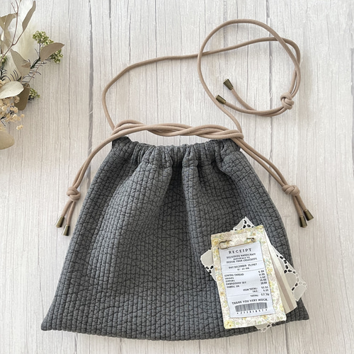 ヌビの巾着ショルダーバッグ☆オシャレなレシートタグ付き＊4way