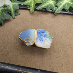 春色シー陶器の金継帯留め 2枚目の画像