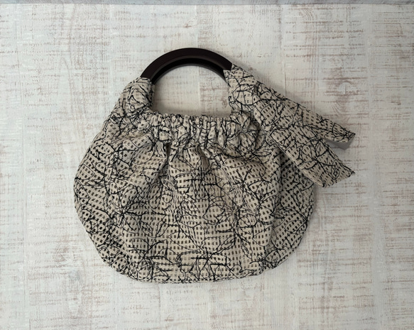 Sサイズ【刺繍メッシュ•木製リングバッグ】 1枚目の画像